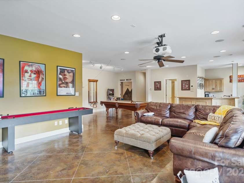 7471 Barfield Lane, Denver, NC 28037.  MLS# CAR4250519, YatesRealty ID 21396. Fully finished walk-out basement designed for entertaining!