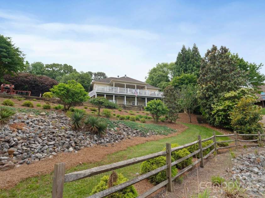 7471 Barfield Lane, Denver, NC 28037.  MLS# CAR4250519, YatesRealty ID 21396. Meticulously landscaped backyard and easy grass walking path to dock.