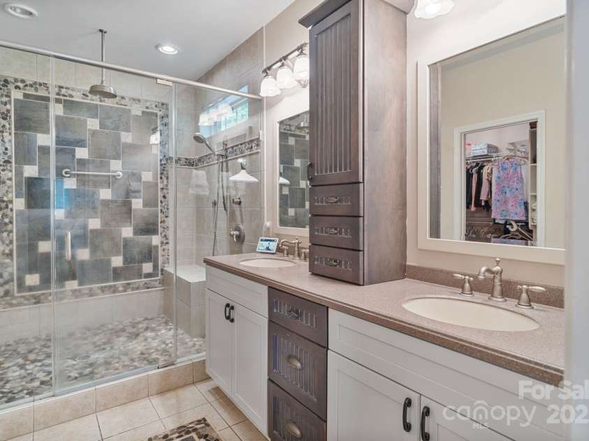 7471 Barfield Lane, Denver, NC 28037.  MLS# CAR4250519, YatesRealty ID 21396. Spacious primary bath with oversized custom shower.