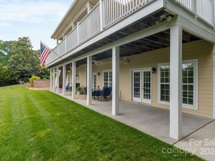 7471 Barfield Lane, Denver, NC 28037.  MLS# CAR4250519, YatesRealty ID 21396. Two great areas to enjoy an evening outback overlooking the lake.