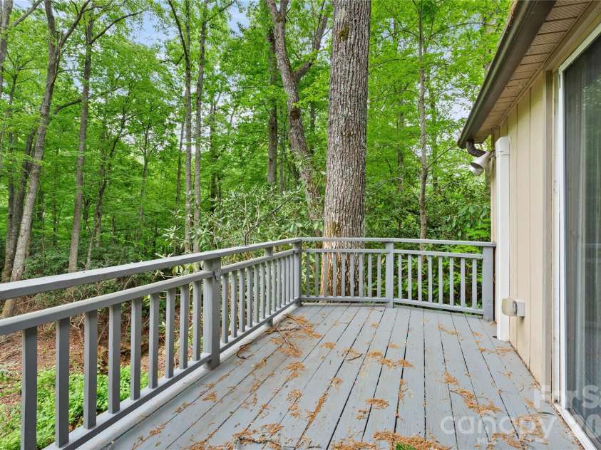 1483 Old Fort Road, Fairview, NC 28730.  MLS# CAR4376966, YatesRealty ID 21397. Deck from primary bedroom