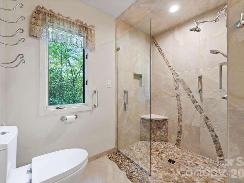 1483 Old Fort Road, Fairview, NC 28730.  MLS# CAR4376966, YatesRealty ID 21397. Primary bathroom on main