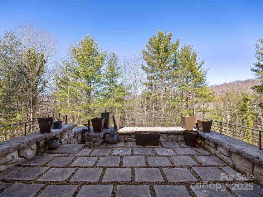 18 Wolfe Cove Road, Asheville, NC 28804.  MLS# CAR4231341, YatesRealty ID 21400. Looking out from the sitting area on the terrace.