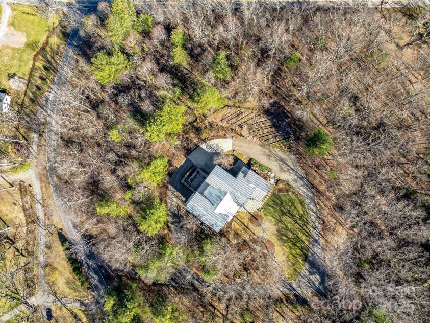 18 Wolfe Cove Road, Asheville, NC 28804.  MLS# CAR4231341, YatesRealty ID 21400. The circular driveway makes for seamless access.