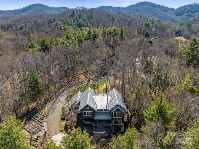 18 Wolfe Cove Road, Asheville, NC 28804.  MLS# CAR4231341, YatesRealty ID 21400. Tucked in the mountains and only 12 minutes to access the Blue Ridge Parkway at Craven Gap.