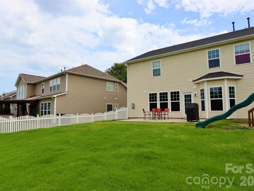 3586 Larkhaven Avenue, Concord, NC 28027.  MLS# CAR4398319, YatesRealty ID 21400. Large backyard
