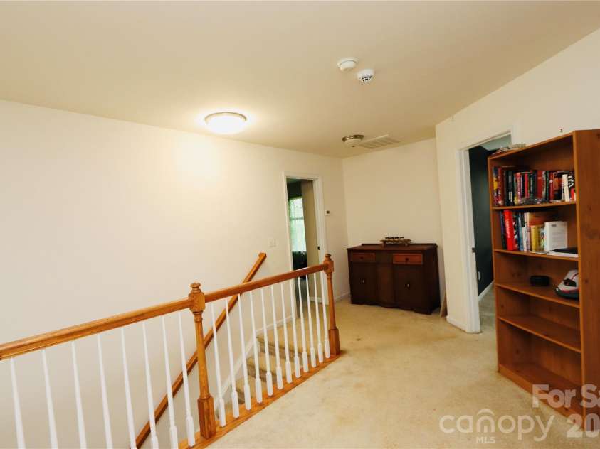 3586 Larkhaven Avenue, Concord, NC 28027.  MLS# CAR4398319, YatesRealty ID 21400. Large upstairs hallway