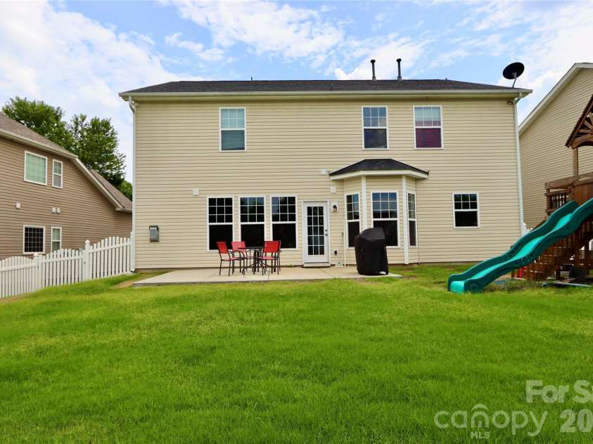 3586 Larkhaven Avenue, Concord, NC 28027.  MLS# CAR4398319, YatesRealty ID 21400. Rear of property