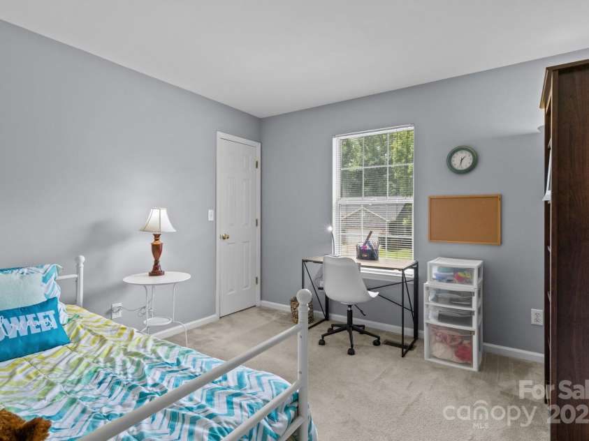 7212 Morsey Court, Charlotte, NC 28269.  MLS# CAR4268326, YatesRealty ID 21404. Secondary Bedroom with walk-in closet!