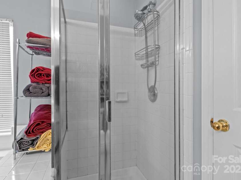 7212 Morsey Court, Charlotte, NC 28269.  MLS# CAR4268326, YatesRealty ID 21404. Separate shower with enclosure