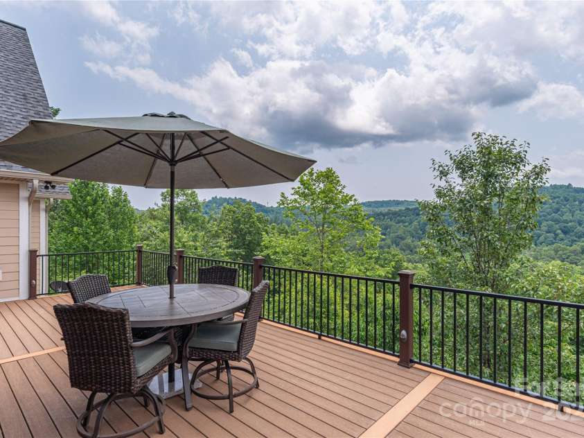 930 Big Raven Lane, Saluda, NC 28773.  MLS# CAR4270163, YatesRealty ID 21407. A trex deck for low maintenance and high durability.