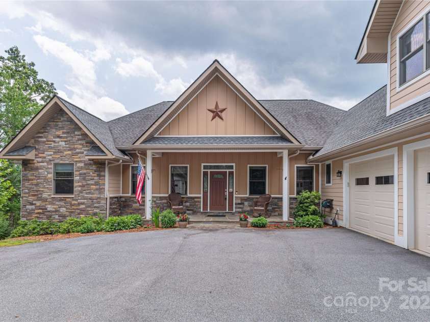930 Big Raven Lane, Saluda, NC 28773.  MLS# CAR4270163, YatesRealty ID 21407. Big views and plenty of level parking