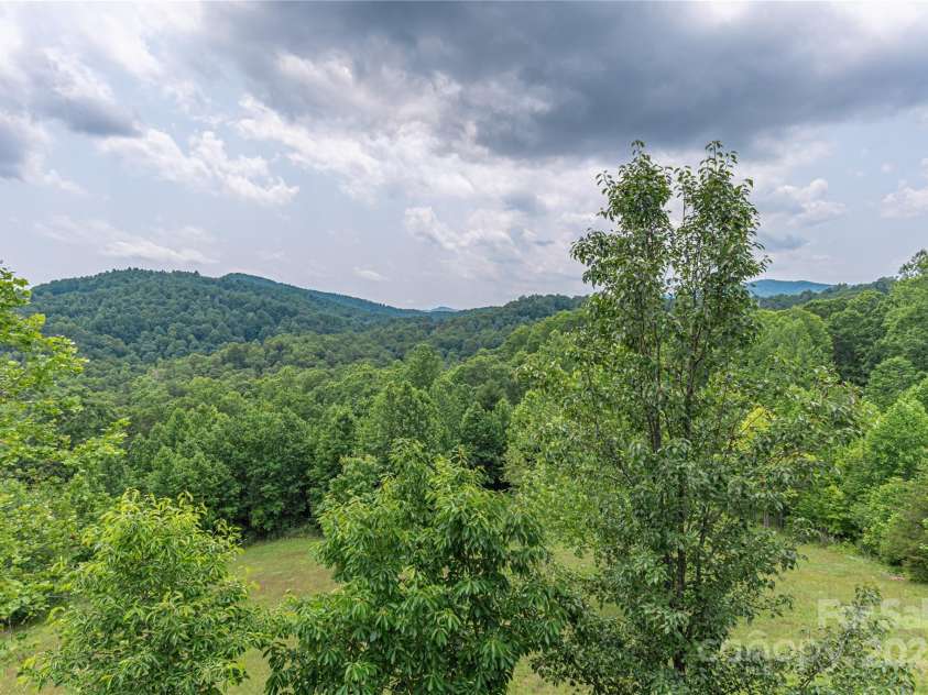930 Big Raven Lane, Saluda, NC 28773.  MLS# CAR4270163, YatesRealty ID 21407. Peace and serenity abound