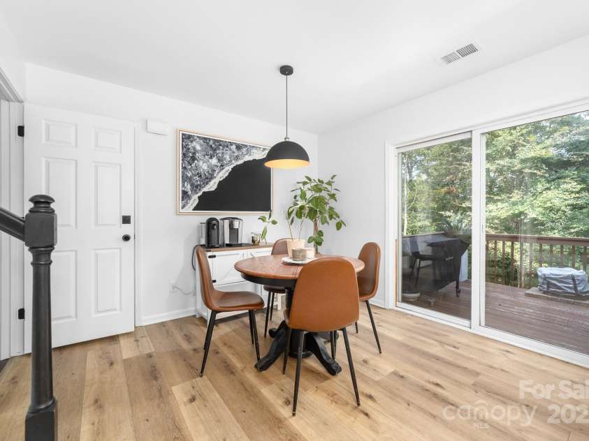1542 Maypine Commons Way, Rock Hill, SC 29732.  MLS# CAR4303451, YatesRealty ID 21408. Dining area with view of the woods