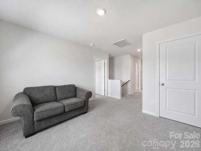 107 Spring Hall Drive, Troutman, NC 28166.  MLS# CAR4363335, YatesRealty ID 21416. Loft
