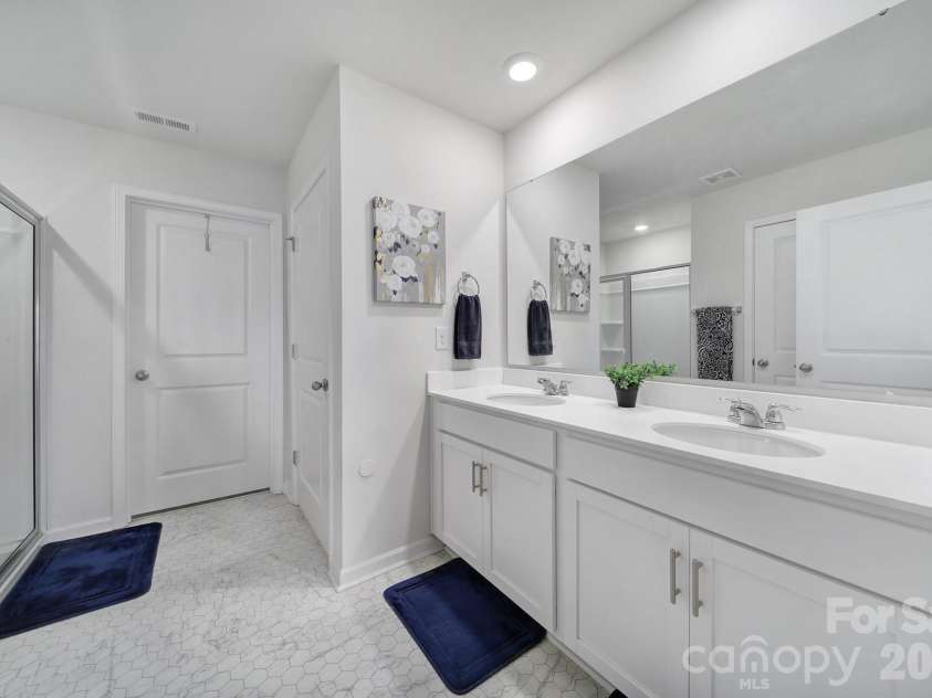 107 Spring Hall Drive, Troutman, NC 28166.  MLS# CAR4363335, YatesRealty ID 21416. Primary Bathroom