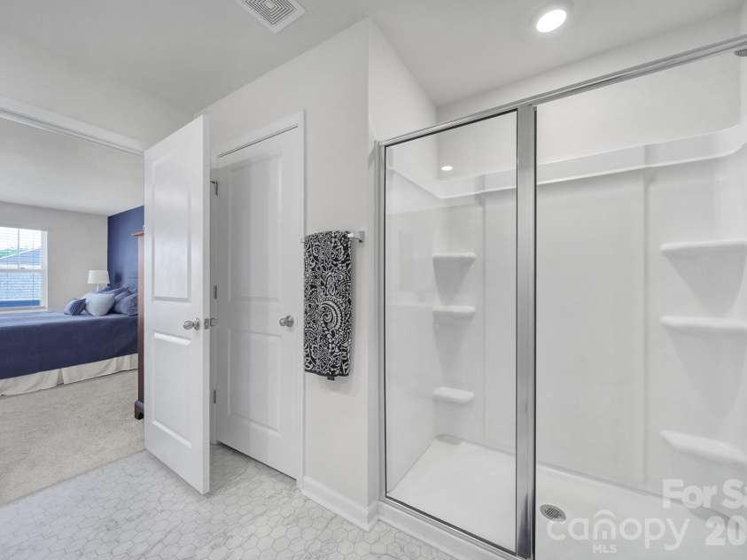 107 Spring Hall Drive, Troutman, NC 28166.  MLS# CAR4363335, YatesRealty ID 21416. Primary Bathroom