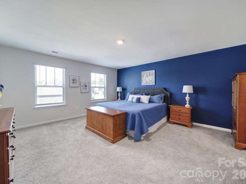 107 Spring Hall Drive, Troutman, NC 28166.  MLS# CAR4363335, YatesRealty ID 21416. Primary Bedroom