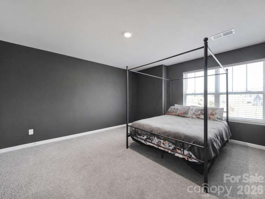 107 Spring Hall Drive, Troutman, NC 28166.  MLS# CAR4363335, YatesRealty ID 21416. Secondary Bedroom