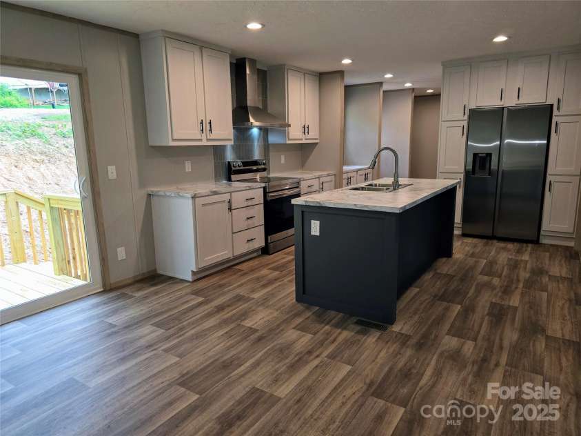 28 McGee Hill Road, Fairview, NC 28730.  MLS# CAR4234757, YatesRealty ID 21416. Eat in dining space into kitchen.