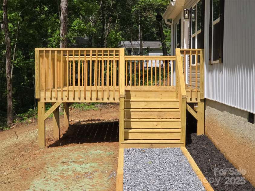 28 McGee Hill Road, Fairview, NC 28730.  MLS# CAR4234757, YatesRealty ID 21416. Front deck.