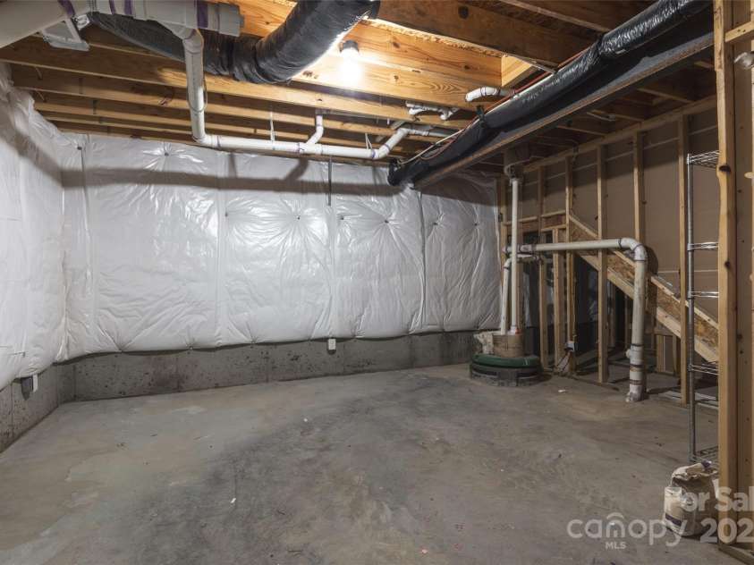 1365 Winged Foot Drive, Denver, NC 28037.  MLS# CAR4252167, YatesRealty ID 21424. Large storage room in basement