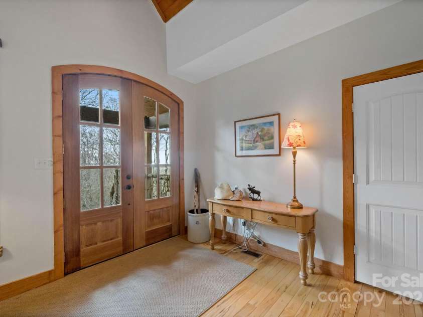 140 Spruce Hollow Road, Beech Mountain, NC 28604.  MLS# CAR4263469, YatesRealty ID 21427. Foyer Drop Zone