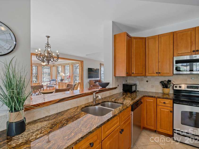 140 Spruce Hollow Road, Beech Mountain, NC 28604.  MLS# CAR4263469, YatesRealty ID 21427. Granite and Live Edge Counters