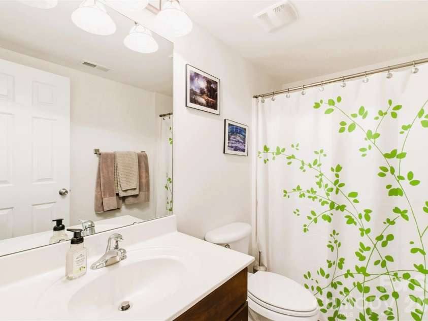 220 Woodwinds Drive, Mount Holly, NC 28120.  MLS# CAR4361261, YatesRealty ID 21427. Basement includes a Full Bath