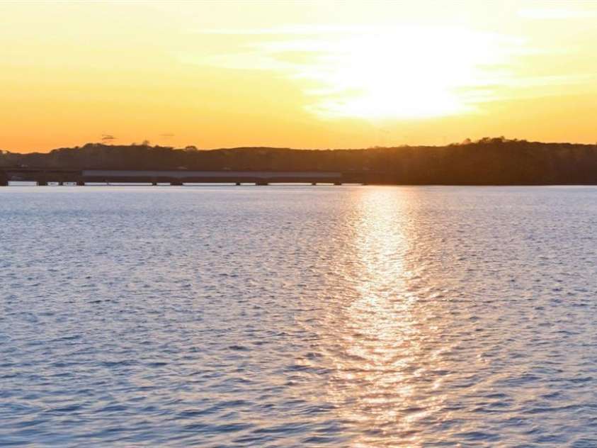 220 Woodwinds Drive, Mount Holly, NC 28120.  MLS# CAR4361261, YatesRealty ID 21427. Beautiful sunsets views from private dock.