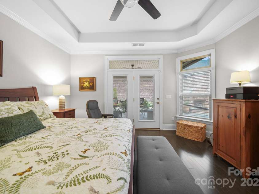 5256 Courtyard Lane, Belmont, NC 28012.  MLS# CAR4299282, YatesRealty ID 2143. Primary bedroom opens onto screened porch