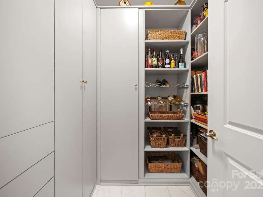 5256 Courtyard Lane, Belmont, NC 28012.  MLS# CAR4299282, YatesRealty ID 2143. Walk-in pantry with custom built-ins for maximum storage