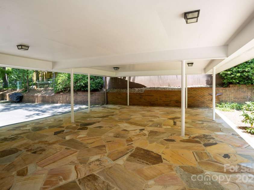 15 Cedar Trail, Asheville, NC 28803.  MLS# CAR4270530, YatesRealty ID 21431. Beautiful custom rear covered patio
