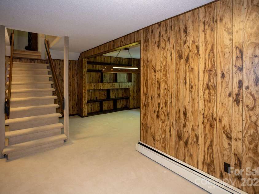 15 Cedar Trail, Asheville, NC 28803.  MLS# CAR4270530, YatesRealty ID 21431. Going up?