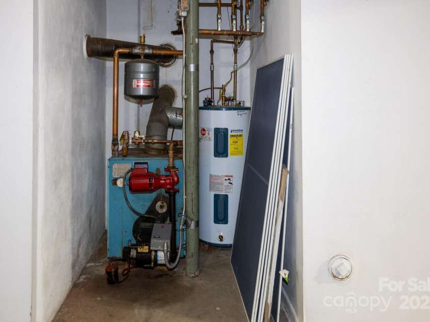 15 Cedar Trail, Asheville, NC 28803.  MLS# CAR4270530, YatesRealty ID 21431. Radiant Boiler heat.