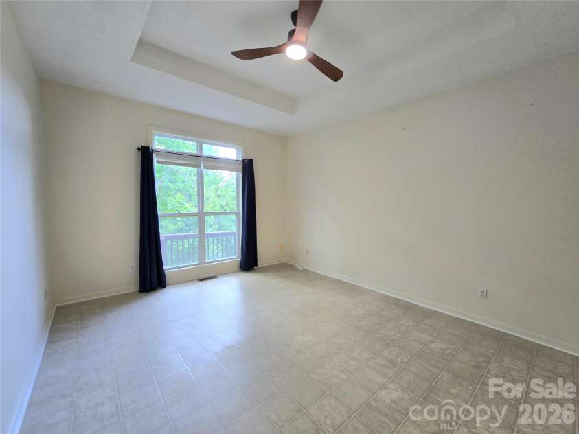 73 Dalya Road, Swannanoa, NC 28778.  MLS# CAR4352117, YatesRealty ID 21431. Primary bed with tray ceiling
