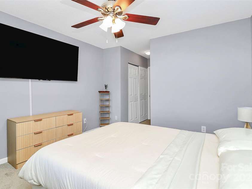5980 Cougar Lane, Charlotte, NC 28269.  MLS# CAR4272520, YatesRealty ID 21432. Bedroom 2 on upper level.