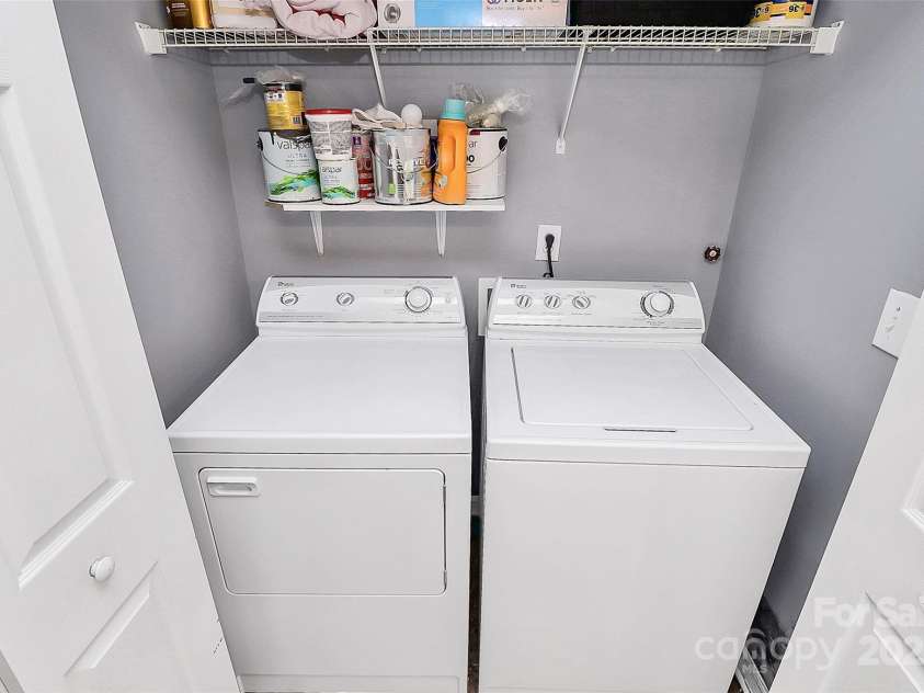 5980 Cougar Lane, Charlotte, NC 28269.  MLS# CAR4272520, YatesRealty ID 21432. Main Floor Laundry.