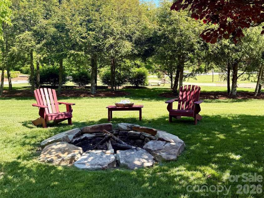 120 Old Lakey Gap Road, Black Mountain, NC 28711.  MLS# CAR4380220, YatesRealty ID 21433. Fire Pit with Adirondack Chairs included 