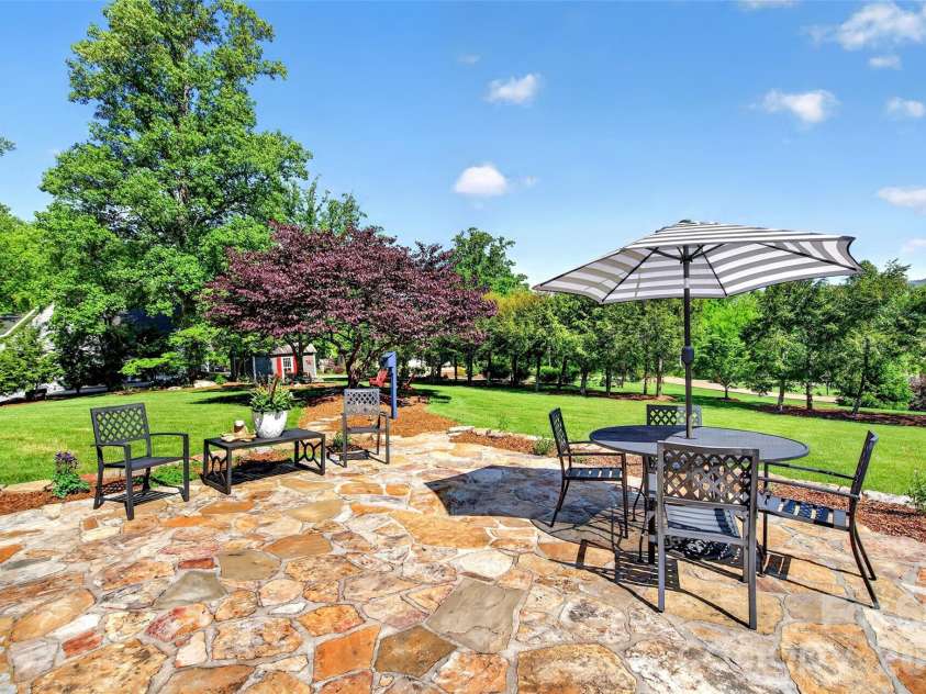 120 Old Lakey Gap Road, Black Mountain, NC 28711.  MLS# CAR4380220, YatesRealty ID 21433. Patio to Fire pit and Shed