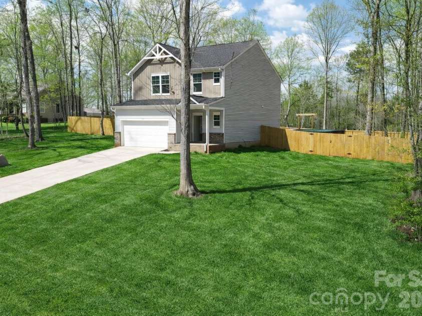 1321 Western Hills Lane, Vale, NC 28168.  MLS# CAR4357906, YatesRealty ID 21439. Virtually enhanced to add grass