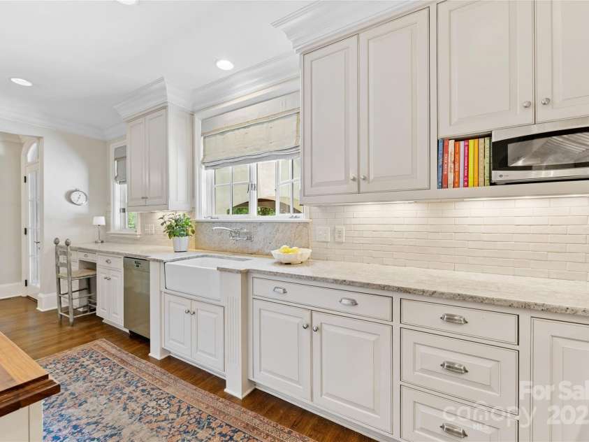 1728 Shadow Forest Drive, Matthews, NC 28105.  MLS# CAR4268214, YatesRealty ID 21441. Apron and prep sinks provide for cooking ease.