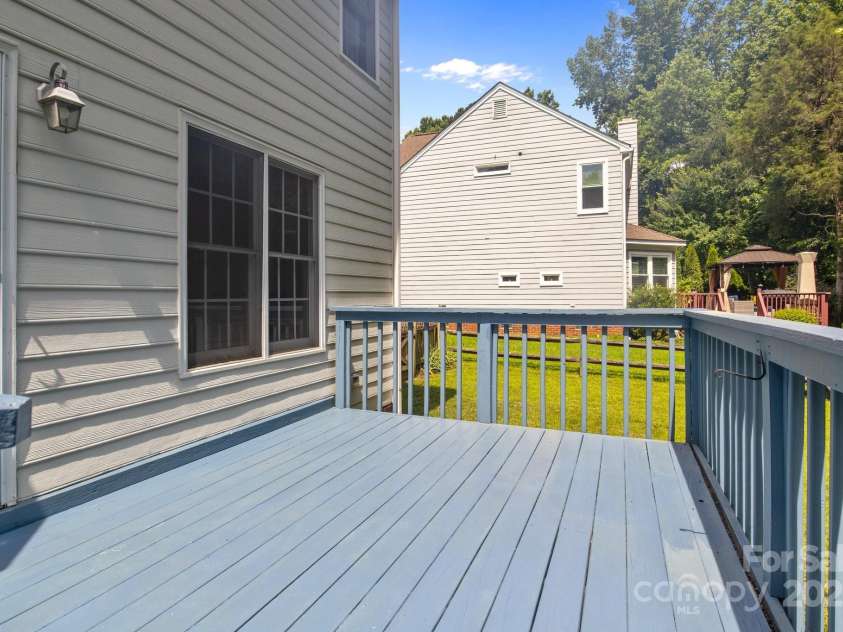 9904 Brigstock Court, Charlotte, NC 28269.  MLS# CAR4268644, YatesRealty ID 21446. Cute back deck