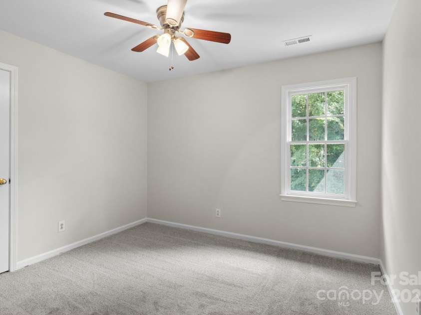 9904 Brigstock Court, Charlotte, NC 28269.  MLS# CAR4268644, YatesRealty ID 21446. Secondary bedroom