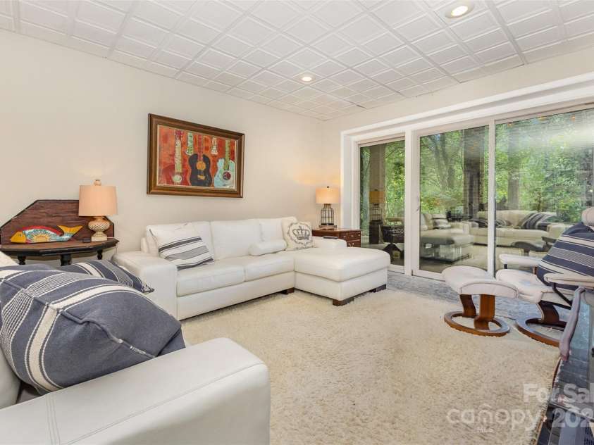 3004 Vernell Lane, Shelby, NC 28150.  MLS# CAR4238720, YatesRealty ID 21447. Doors lead to more outdoor living area overlooking the cove