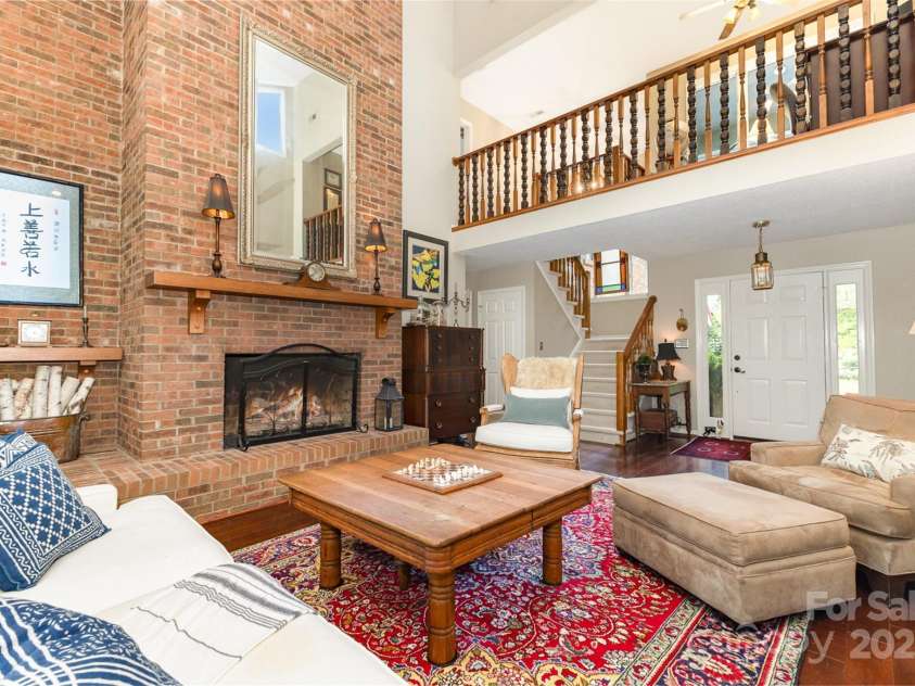 3004 Vernell Lane, Shelby, NC 28150.  MLS# CAR4238720, YatesRealty ID 21447. Gather around the brick hearth fireplace