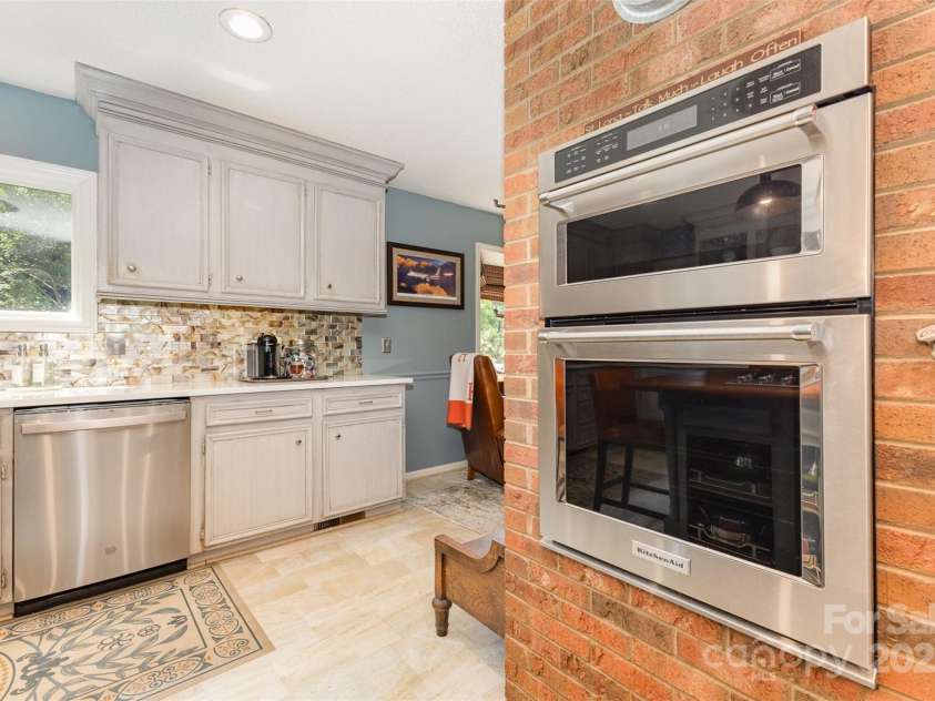 3004 Vernell Lane, Shelby, NC 28150.  MLS# CAR4238720, YatesRealty ID 21447. Wall ovens and brick accent wall