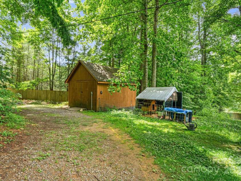 24 Cataloochee Lane, Waynesville, NC 28785.  MLS# CAR4268392, YatesRealty ID 21448. Large workshop with electricity