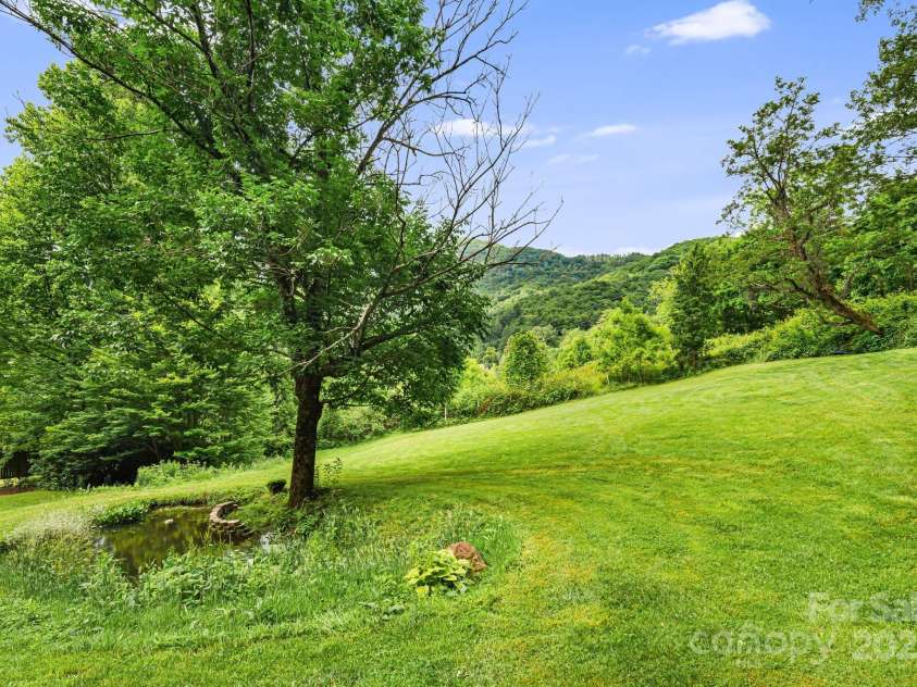 24 Cataloochee Lane, Waynesville, NC 28785.  MLS# CAR4268392, YatesRealty ID 21448. Rolling hills