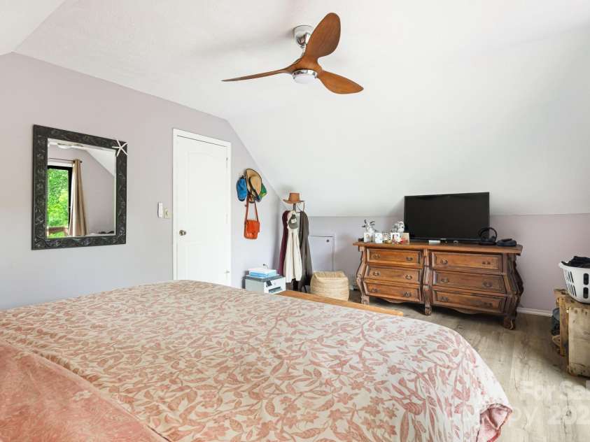 24 Cataloochee Lane, Waynesville, NC 28785.  MLS# CAR4268392, YatesRealty ID 21448. Third bedroom with balcony